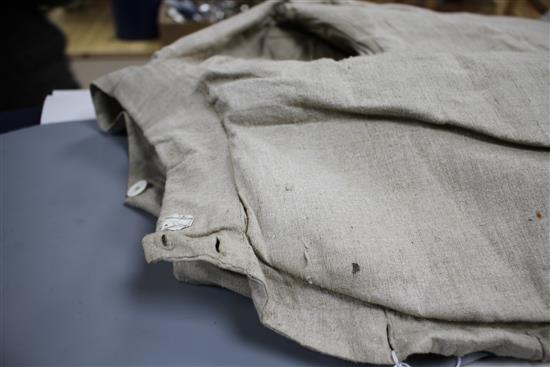 A late 19th century linen fencing jacket, with suede leather protect for body and arm for right handed fencer